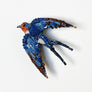 Beaded Orange Face Swallow Embroidered Pin by Trovelore