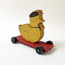 Vintage Wood Duck in a Cap on Wheels