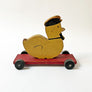 Vintage Wood Duck in a Cap on Wheels