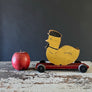 Vintage Wood Duck in a Cap on Wheels