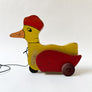 Vintage Wood Duck with a Hat on Wheels Decorative Object