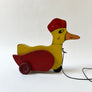 Vintage Wood Duck with a Hat on Wheels Decorative Object