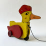 Vintage Wood Duck with a Hat on Wheels Decorative Object
