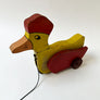 Vintage Wood Duck with a Hat on Wheels Decorative Object