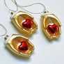 Heart in Hands Glass Ornament