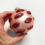 Surreal Pale Pink Ball with Red Sparkly Lips Glass Ornament