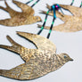 Brass Flying Swallow with Beads & Ribbon Wall Art
