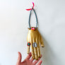 Jeweled Brass Hand with Purple & Teal Beads Wall Art