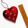 Surreal Red Heart with Eyes Glass Ornament