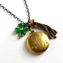 PATCH NYC Treasure Necklace: Vintage Gold Tone Locket with Tassel & Lucky Clover