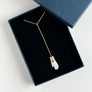 Mother of Pearl Hand with Turquoise Lariat Necklace