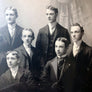 Vintage Group Portrait Photograph of One Woman and Nine Men in a Wood Frame