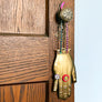 Brass Jeweled Hand with Pink Ribbon Wall Art