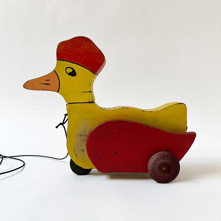 Vintage Wood Duck with a Hat on Wheels Decorative Object