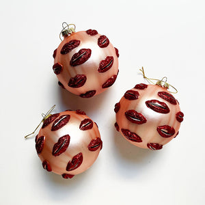 Surreal Pale Pink Ball with Red Glitter Lips Glass Ornament