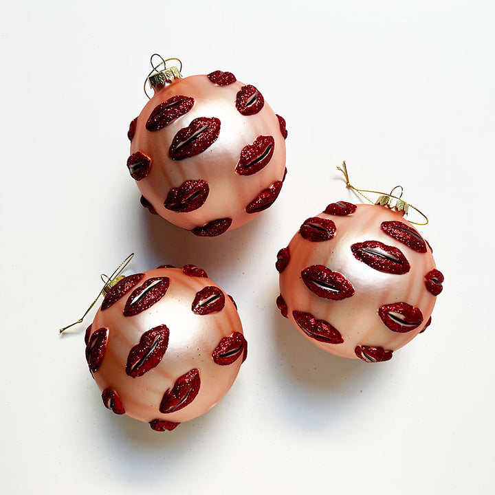 Surreal Pale Pink Ball with Red Sparkly Lips Glass Ornament