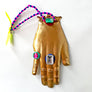 Jeweled Brass Hand with Purple & Navy Beads Wall Art