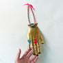 Jeweled Brass Hand with Red & White Beads Wall Art