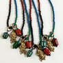 Color Block Beaded Necklace with Skull & Crossbones Charm