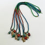 Color Block Beaded Necklace with Skull & Crossbones Charm