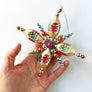 Tinsel Starburst Glass Ornament Gold