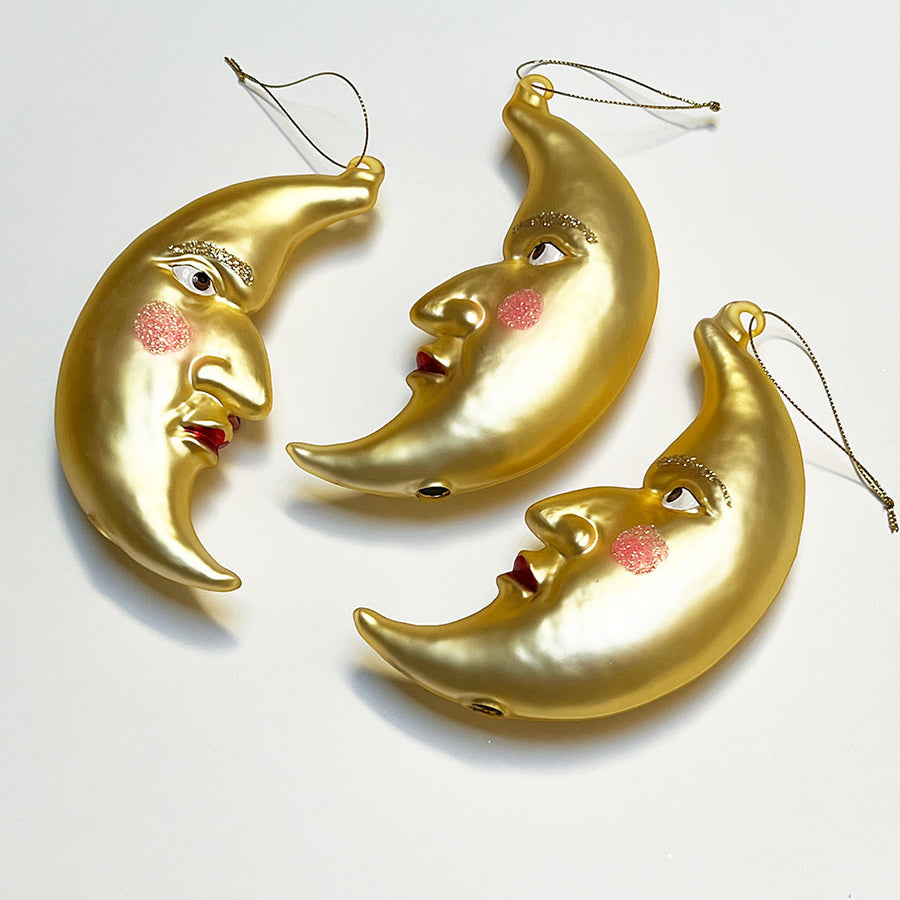 Rosy Cheek Crescent Moon Man Gold Glass Ornament