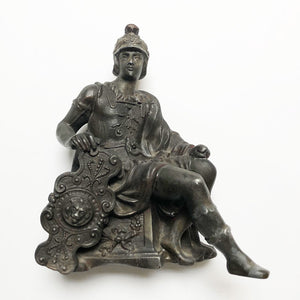 Vintage Seated Man with Shield Metal Sculpture